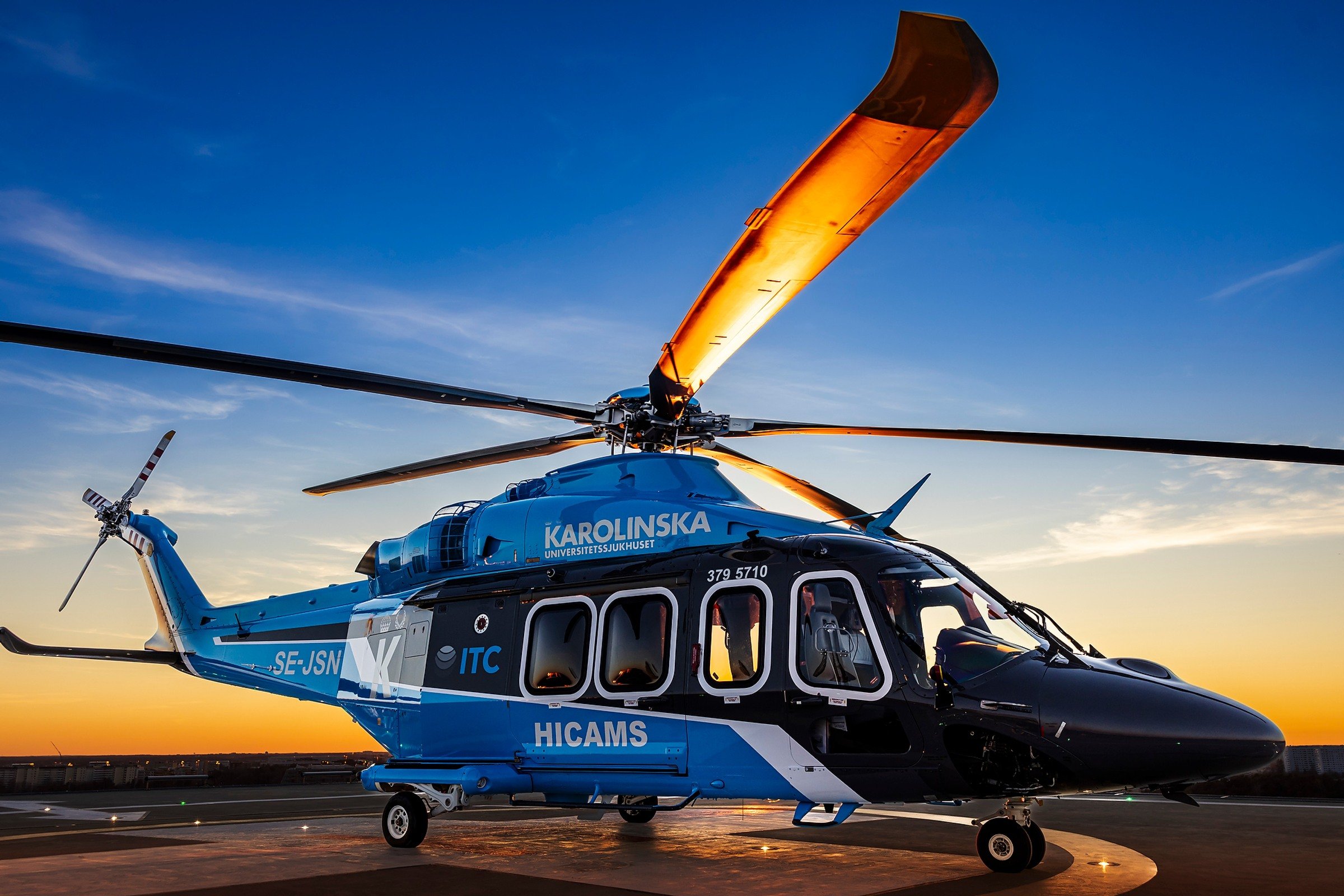 karolinska branded helicopter in sunset